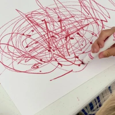 Child makes marks by following how Mr. Marker takes a walk