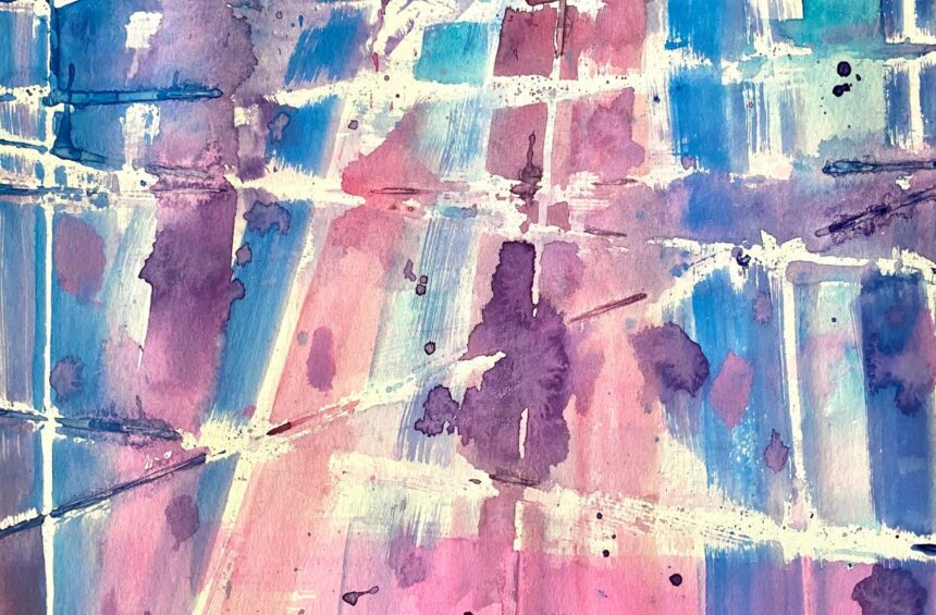 Child painting over rubber band secured to a paper