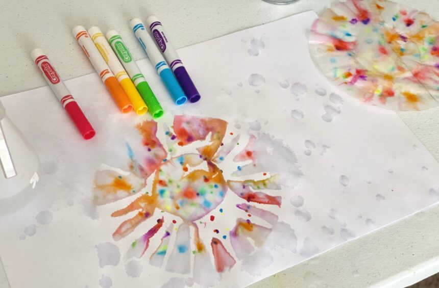 Design left by coffee filters sprayed with water and drawn with markers
