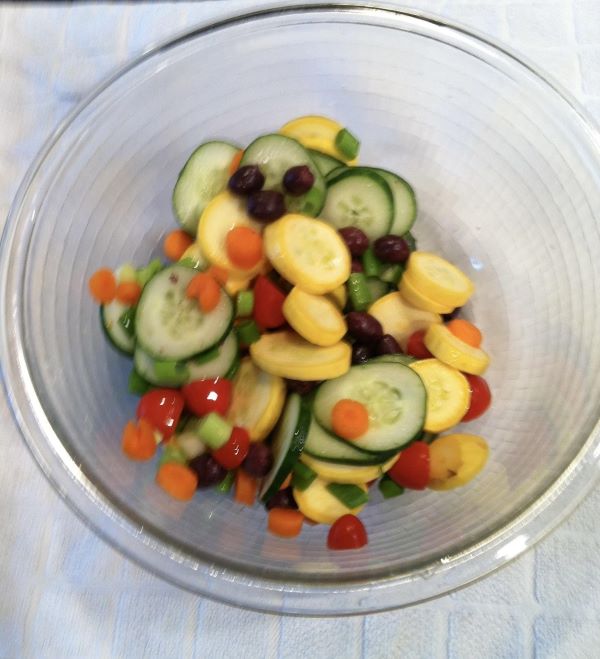 mixed vegetable salad in a glass bowl