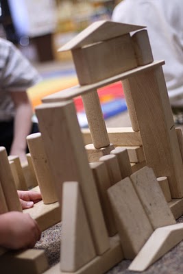 Block Play developmental stages make bridges to connect two blocks
